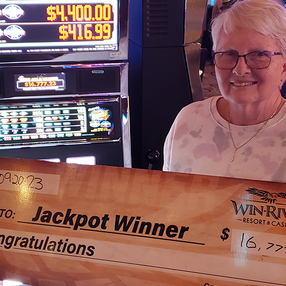Photo of a slot machine, and jackpot winner showing a jackpot win of $16,777