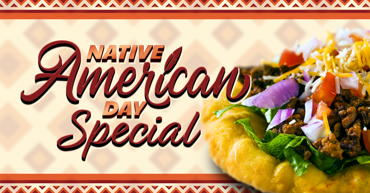 The image is a promotional banner that reads “NATIVE American DAY Special” in bold, stylized text. The background features a beige tribal pattern with red geometric borders. On the right, there’s a close-up of a frybread taco topped with seasoned meat, cheese, lettuce, tomatoes, and onions.