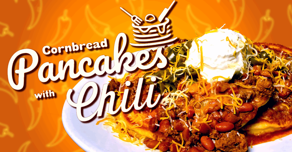 This image is advertising a dish of cornbread pancakes topped with chili. The right side features a close-up of the meal, showing golden cornbread pancakes smothered in hearty chili with beans, shredded cheese, sliced jalapeños, and a generous dollop of sour cream. On the left, bold and decorative text in white and yellow stands out against a vibrant orange background patterned with chili peppers, adding a spicy and inviting feel. The combination of warm colors and mouth-watering visuals is designed to entice viewers to try this savory, comfort food creation.